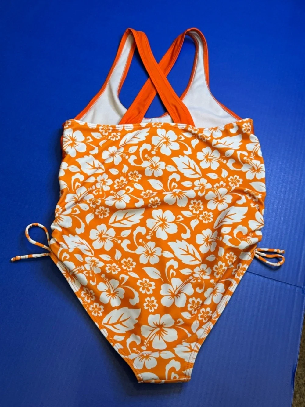 Girls Orange Floral One-Piece Swimsuit with Crisscross Straps